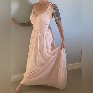 Beautiful prom dress/bridesmaid dress/wedding gown. Never worn still has tags!